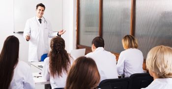 The medical team engaged in a seminar or meeting.